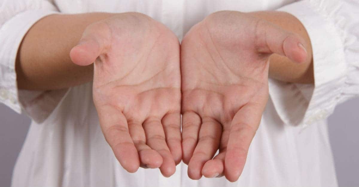 Image of two open hands together held out in a gesture of offering.