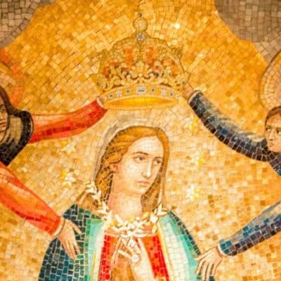 Image of Mary surrounded by angles, some of whom are placing a crown on her head.