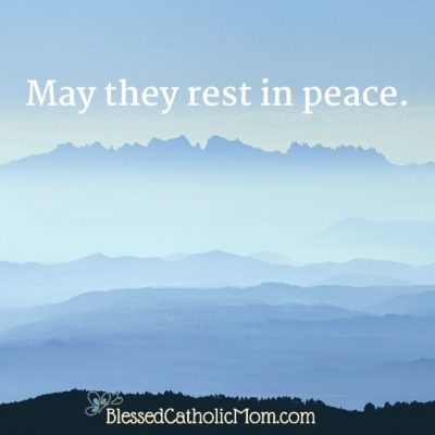 Image of a blue evening sky in the mountains. The words May they rest in peace are in the image.