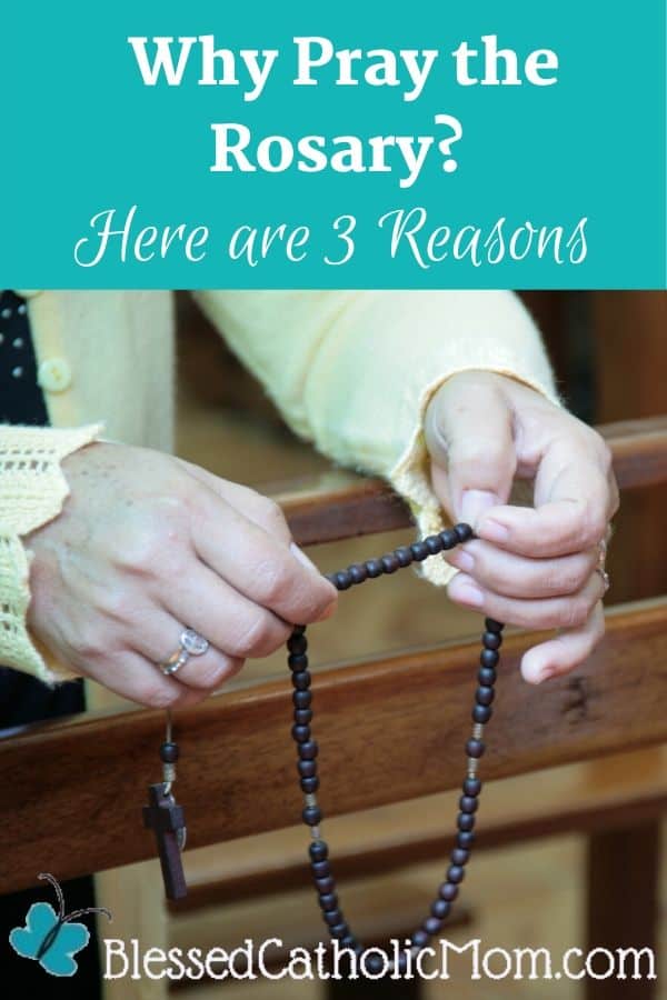 Image of a woman's hands holding a Rosary in prayer as her arms lean on the edge of a pew in church. Words above the image read: Why Pray the Rosary? Here are 3 Reasons