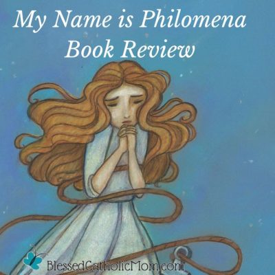 Image of a color drawing of St. Philomena at the bottom of the Tiber with an anchor tied to her. Title reads: My name is Philomena book review. Logo for Blessed Catholic Mom is on the bottom.