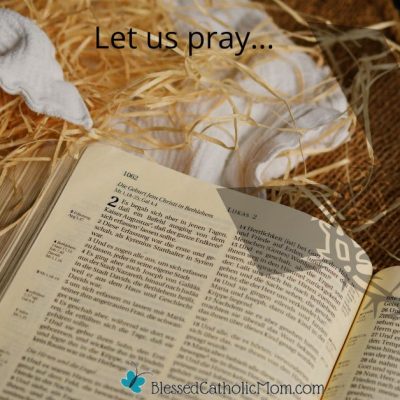 Image of an open Bible on hay. Let us pray... is at the top of the image and the logo for Blessed Catholic Mom is below.
