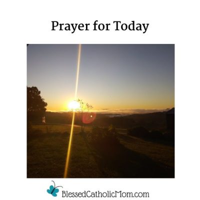 Image of a sunrise over farmland; a tree and part of a house can be seen in the lesft side of the photo. Words Prayer for Today are above the image and the logo for Blessed Catholic Mom is below.